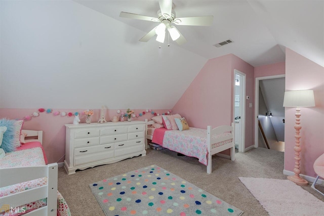 bedroom featuring lofted ceiling, light colored carpet, visible vents, a ceiling fan, and baseboards