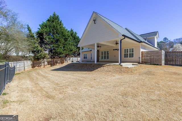 rear view of property with a patio area, a fenced backyard, and ceiling fan