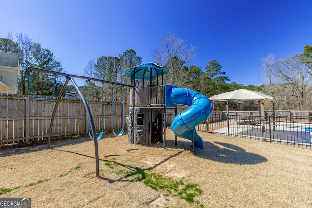 view of playground with fence