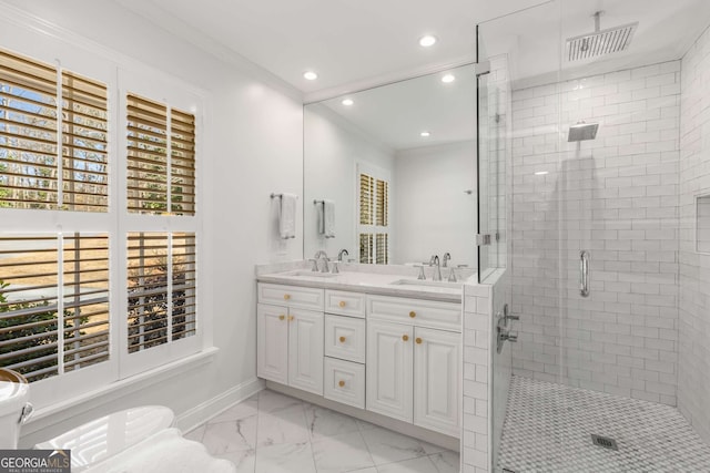 bathroom featuring a stall shower, visible vents, marble finish floor, crown molding, and a sink