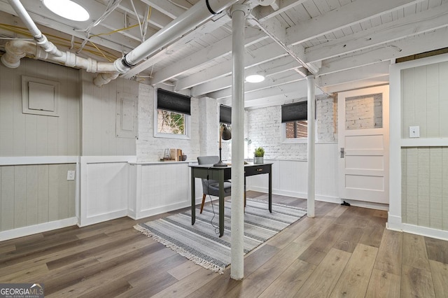 basement featuring wood finished floors