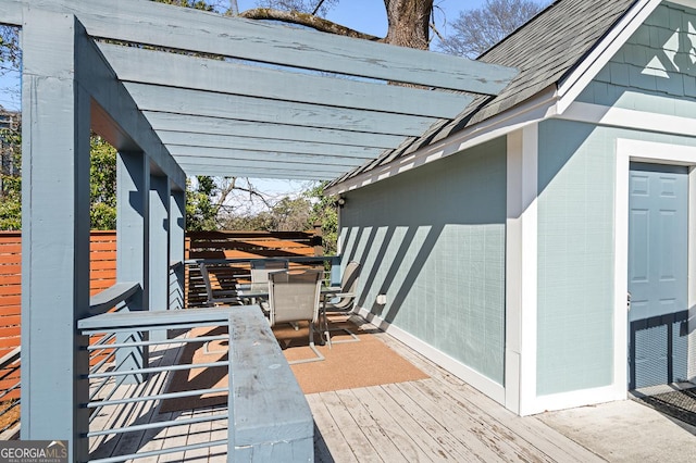 deck with outdoor dining space