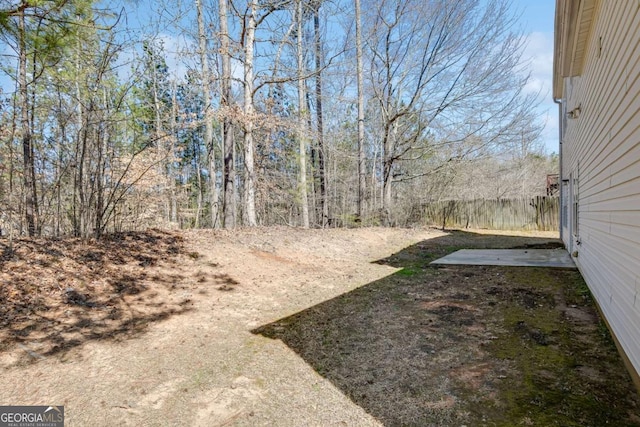 view of yard featuring fence