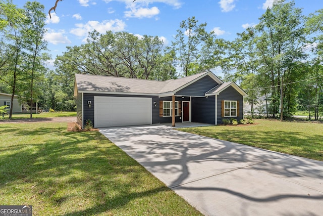 117 Giles Ave, Rincon, GA 31326 - view of front of home with a garage