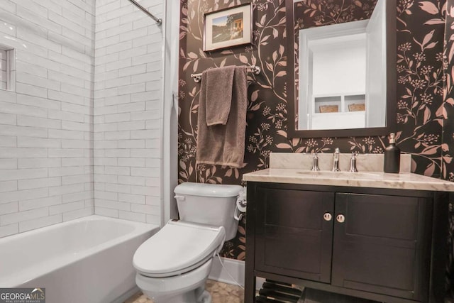 full bathroom with washtub / shower combination, vanity, toilet, and wallpapered walls