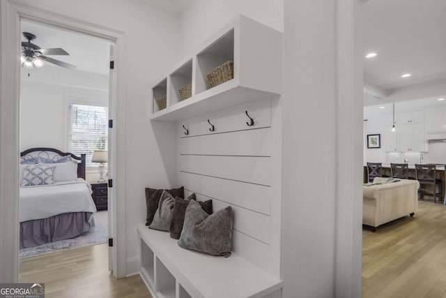 mudroom featuring light wood finished floors, a ceiling fan, and recessed lighting