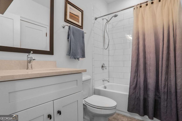 bathroom with vanity, shower / bath combination with curtain, and toilet