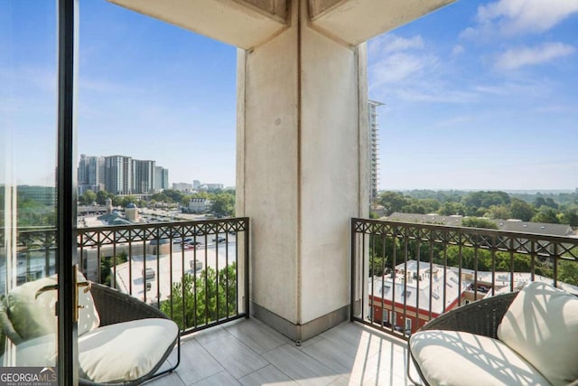 balcony featuring a view of city