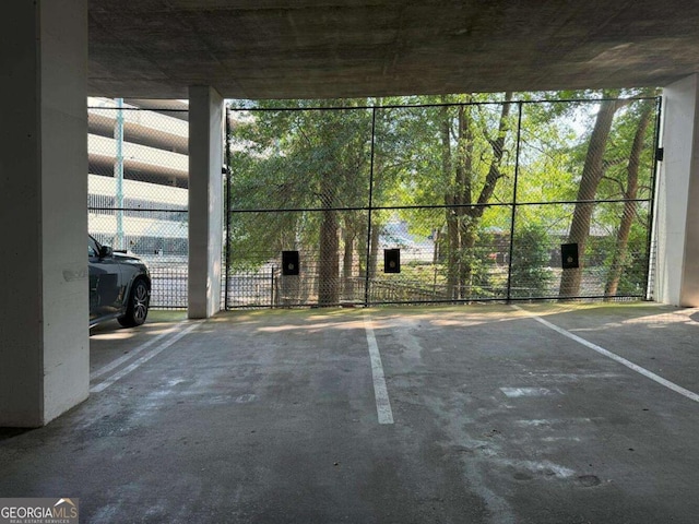 parking garage featuring a gate