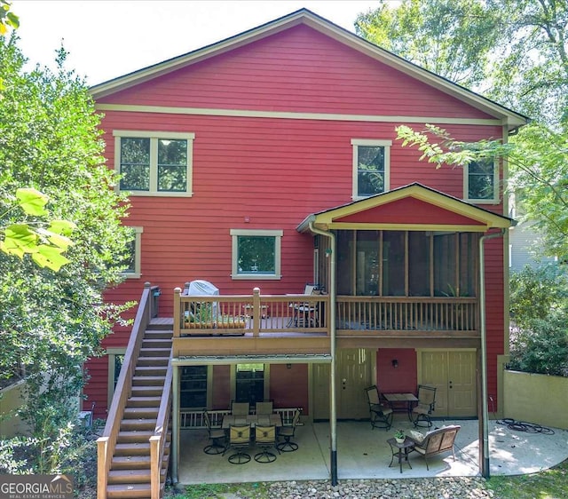 1190 Cobblestone Ln, Bogart, GA 30622 - back of house featuring stairs, a patio area, a sunroom, and a deck