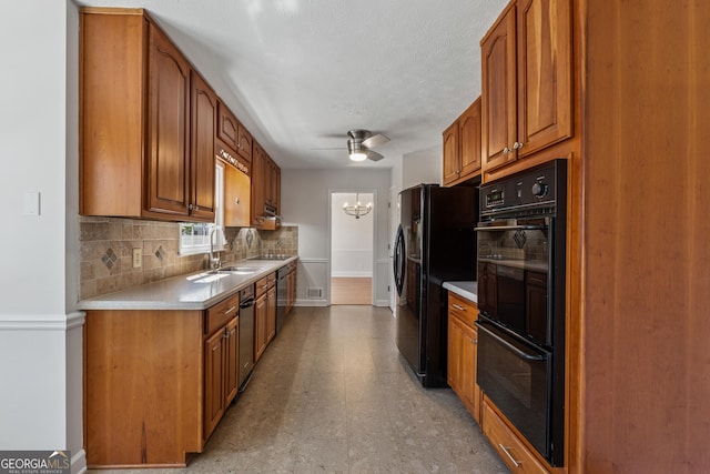 kitchen featuring black appliances, decorative backsplash, brown cabinets, and light countertops