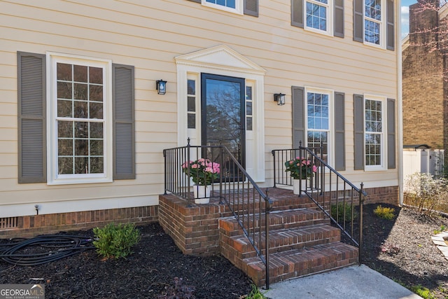 view of exterior entry featuring crawl space