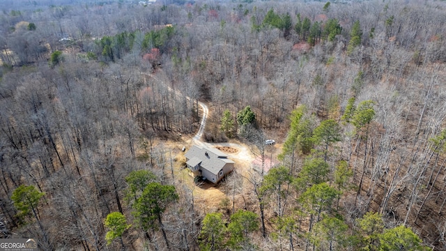 aerial view featuring a view of trees