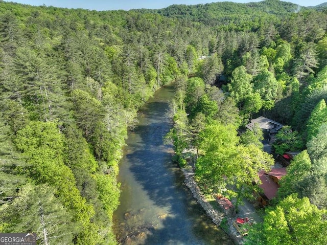 aerial view featuring a forest view