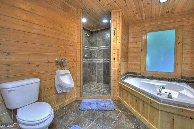 bathroom with toilet, wood walls, a shower stall, wooden ceiling, and tile patterned floors