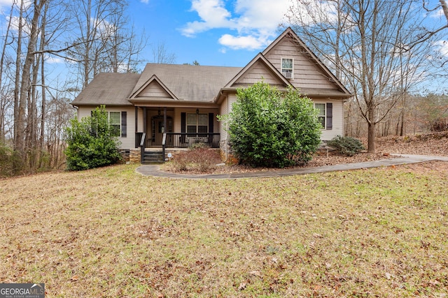 view of front of property with crawl space, a front lawn, and a porch