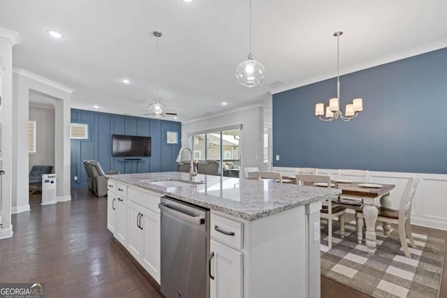 kitchen with a decorative wall, ceiling fan with notable chandelier, dark wood-type flooring, a sink, and dishwasher