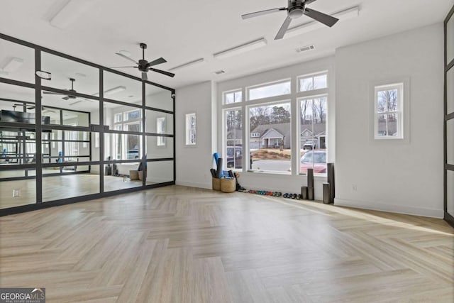 6968 River Rock Dr, Flowery Branch, GA 30542 - empty room featuring a ceiling fan and baseboards