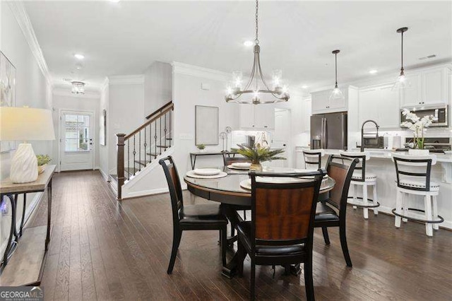 dining room with recessed lighting, crown molding, dark wood-style flooring, stairs, and an inviting chandelier