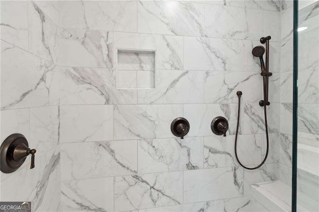 details with a tile shower