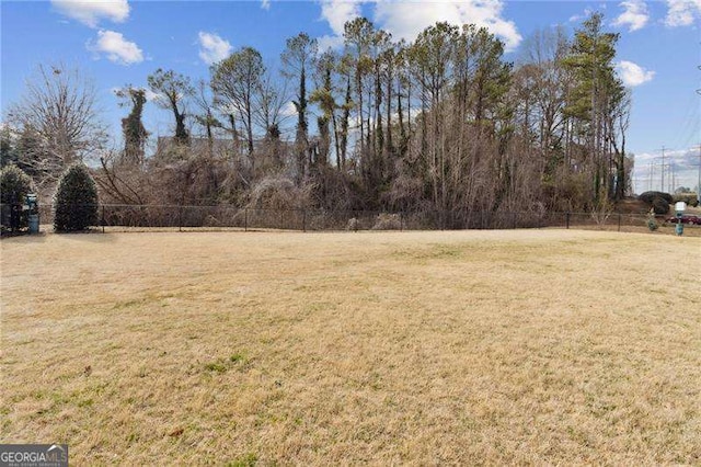 view of yard featuring fence