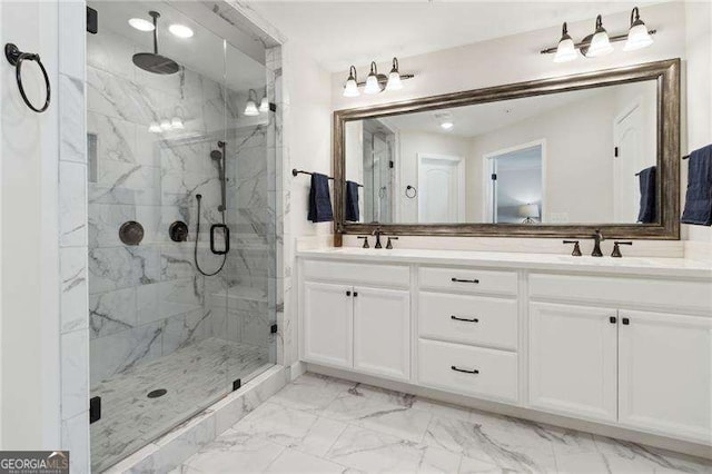 bathroom featuring a sink, marble finish floor, double vanity, and a marble finish shower