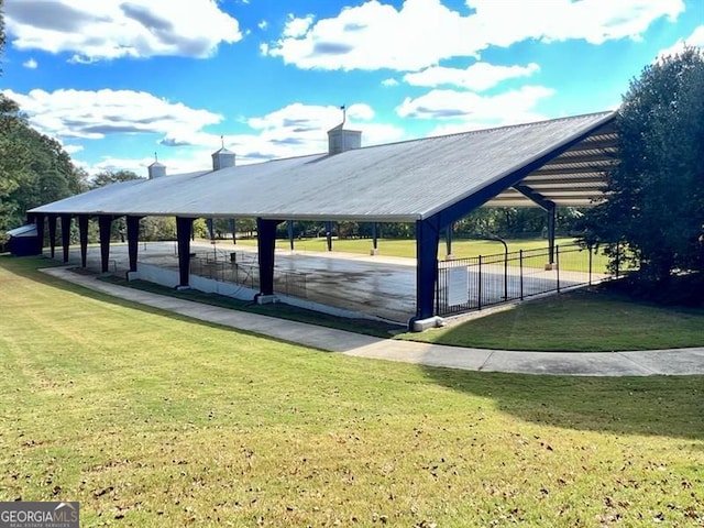 surrounding community with a gazebo and a lawn