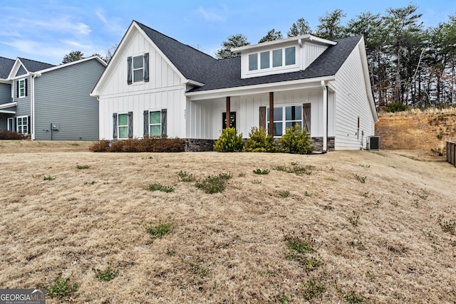 modern inspired farmhouse with roof with shingles, board and batten siding, and central air condition unit