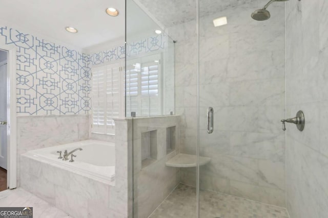 bathroom with a garden tub and a stall shower