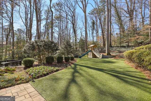 view of yard featuring a playground