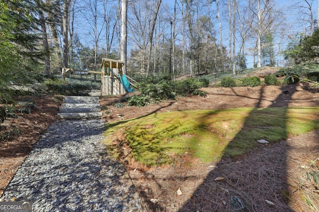 view of yard with a playground