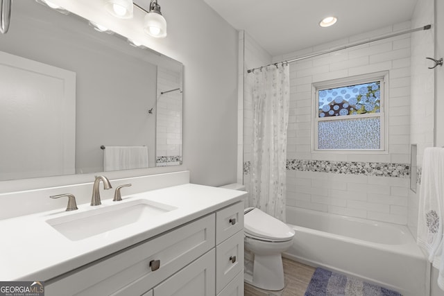 bathroom featuring shower / bathtub combination with curtain, toilet, wood finished floors, and vanity