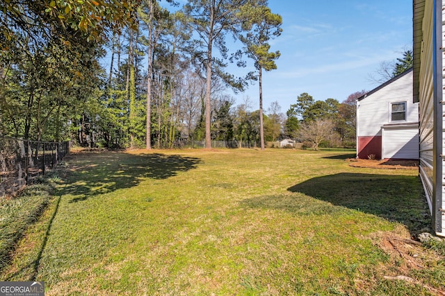 view of yard featuring fence