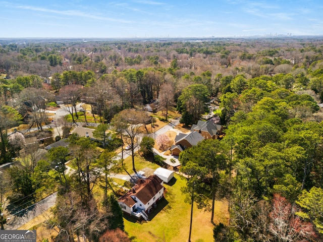 bird's eye view featuring a view of trees