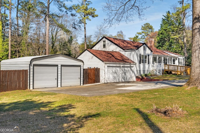 detached garage with fence