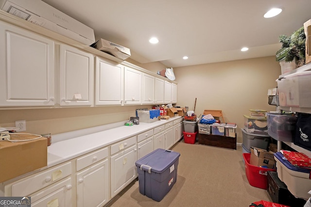 washroom featuring recessed lighting and light carpet