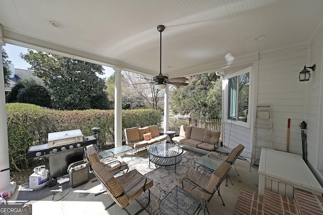 view of patio / terrace with grilling area, ceiling fan, and outdoor lounge area