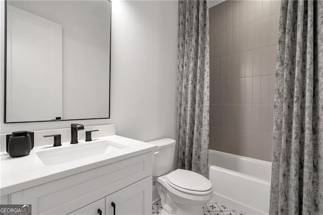 full bathroom featuring shower / bath combo with shower curtain, vanity, and toilet