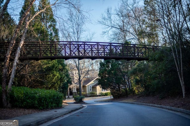 view of road featuring curbs and sidewalks