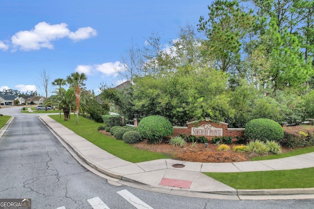 view of street featuring sidewalks and curbs