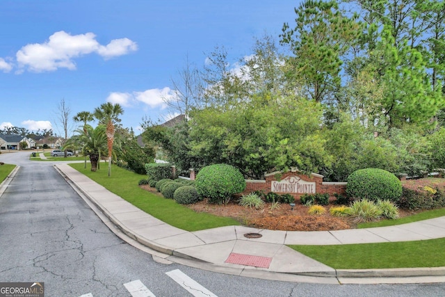 view of road featuring curbs and sidewalks