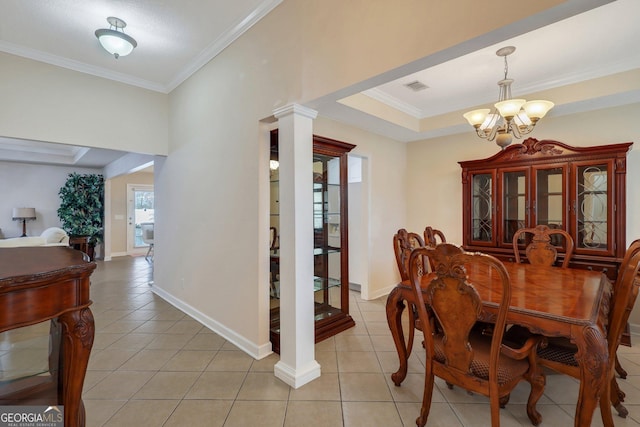 dining space featuring a tray ceiling, visible vents, crown molding, and light tile patterned floors