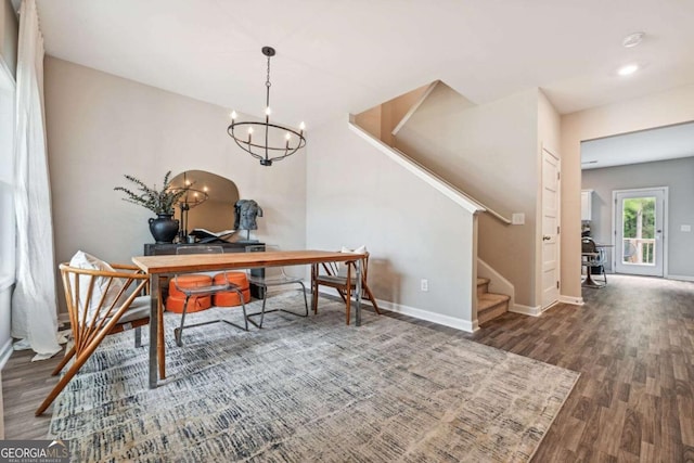 office space with baseboards and wood finished floors