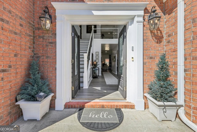 entrance to property with brick siding