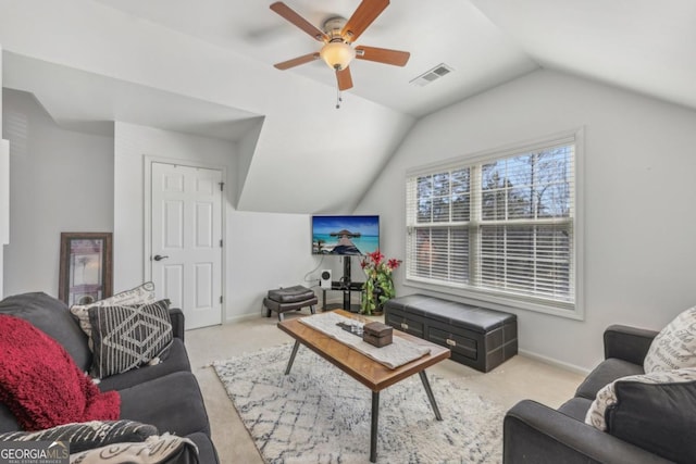 living area featuring visible vents, baseboards, lofted ceiling, ceiling fan, and carpet