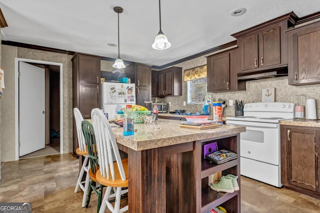 378 Temple Terrace Cir, Cairo, GA 39828 - kitchen featuring open shelves, white appliances, dark brown cabinets, and under cabinet range hood