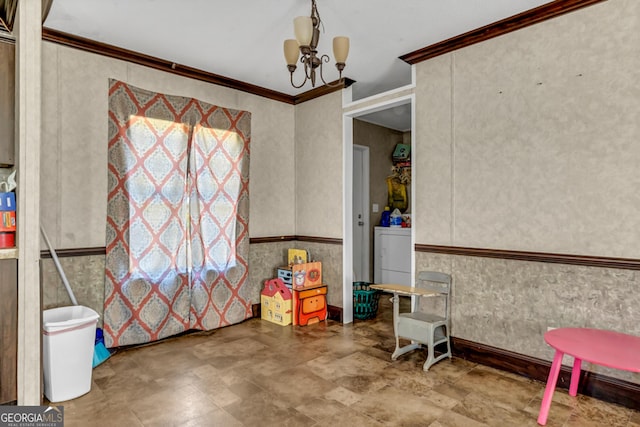 378 Temple Terrace Cir, Cairo, GA 39828 - dining room featuring washer / dryer, a wainscoted wall, crown molding, and an inviting chandelier