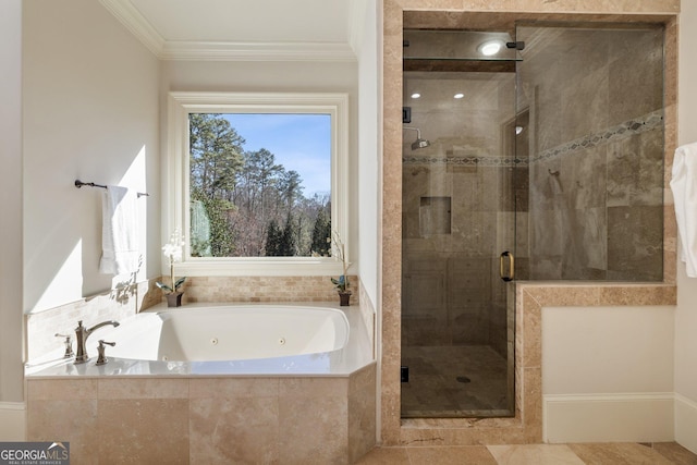 full bath featuring a stall shower, a jetted tub, and ornamental molding