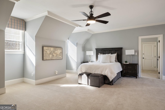 carpeted bedroom featuring ceiling fan, baseboards, lofted ceiling, and ornamental molding