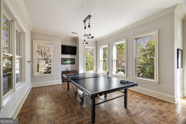 game room featuring visible vents, baseboards, and ornamental molding